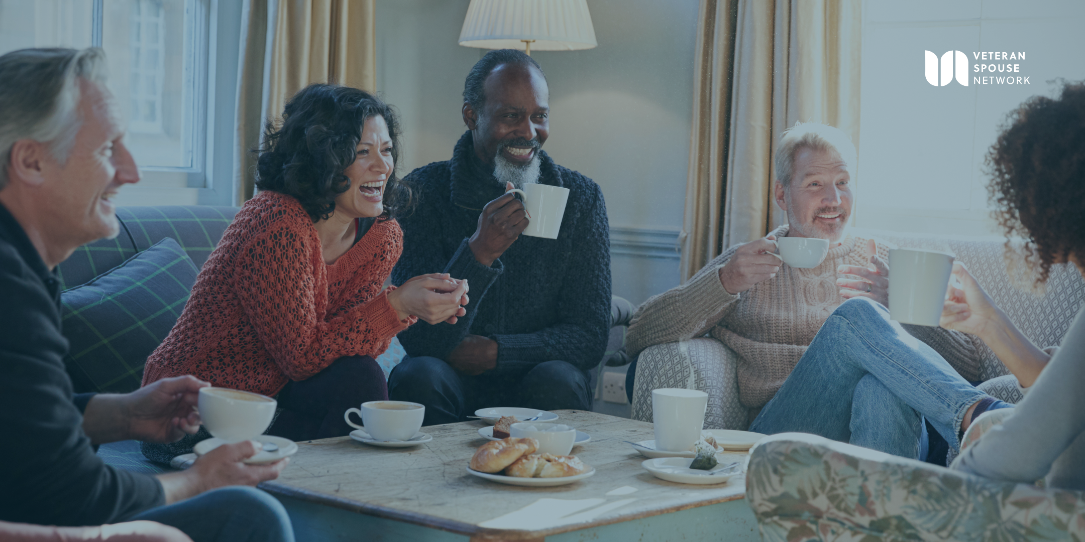 Military and veteran spouses and family members chatting over morning coffee