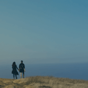 Veteran couple walking together while dealing with PTSD within their relationship