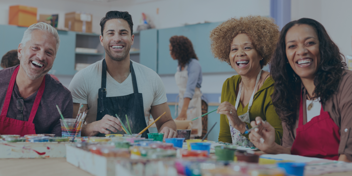 Adults participating in art class